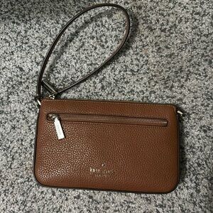 Kate spade wristlet -camel with black piping